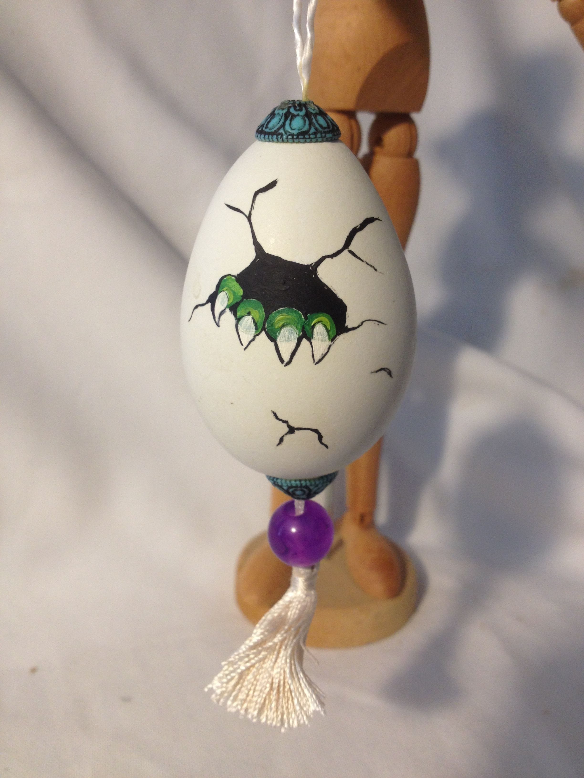 Painted chicken egg with hatching green dragonett's claws$20.