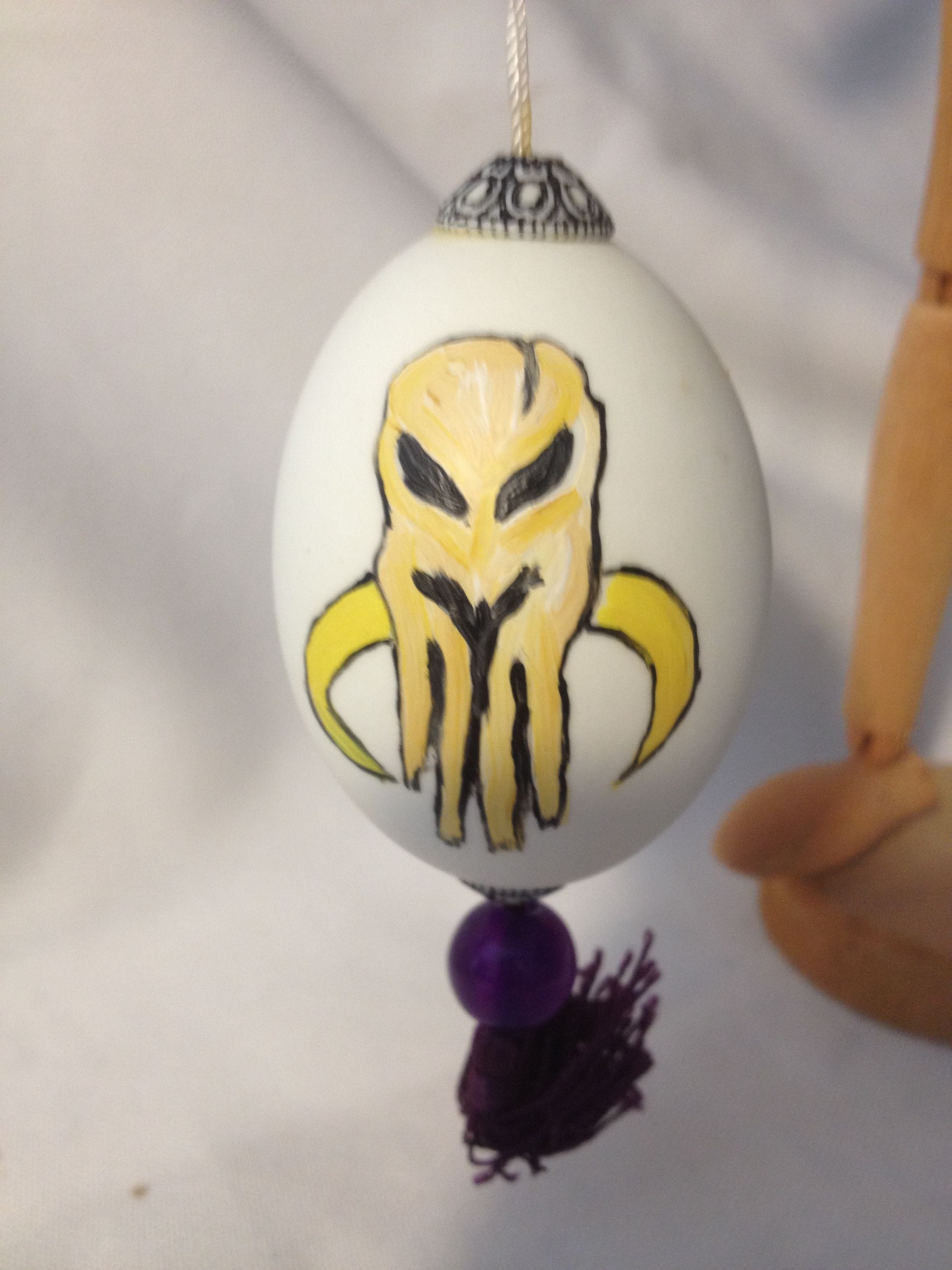 Painted chicken egg with Mandalorian emblem $20