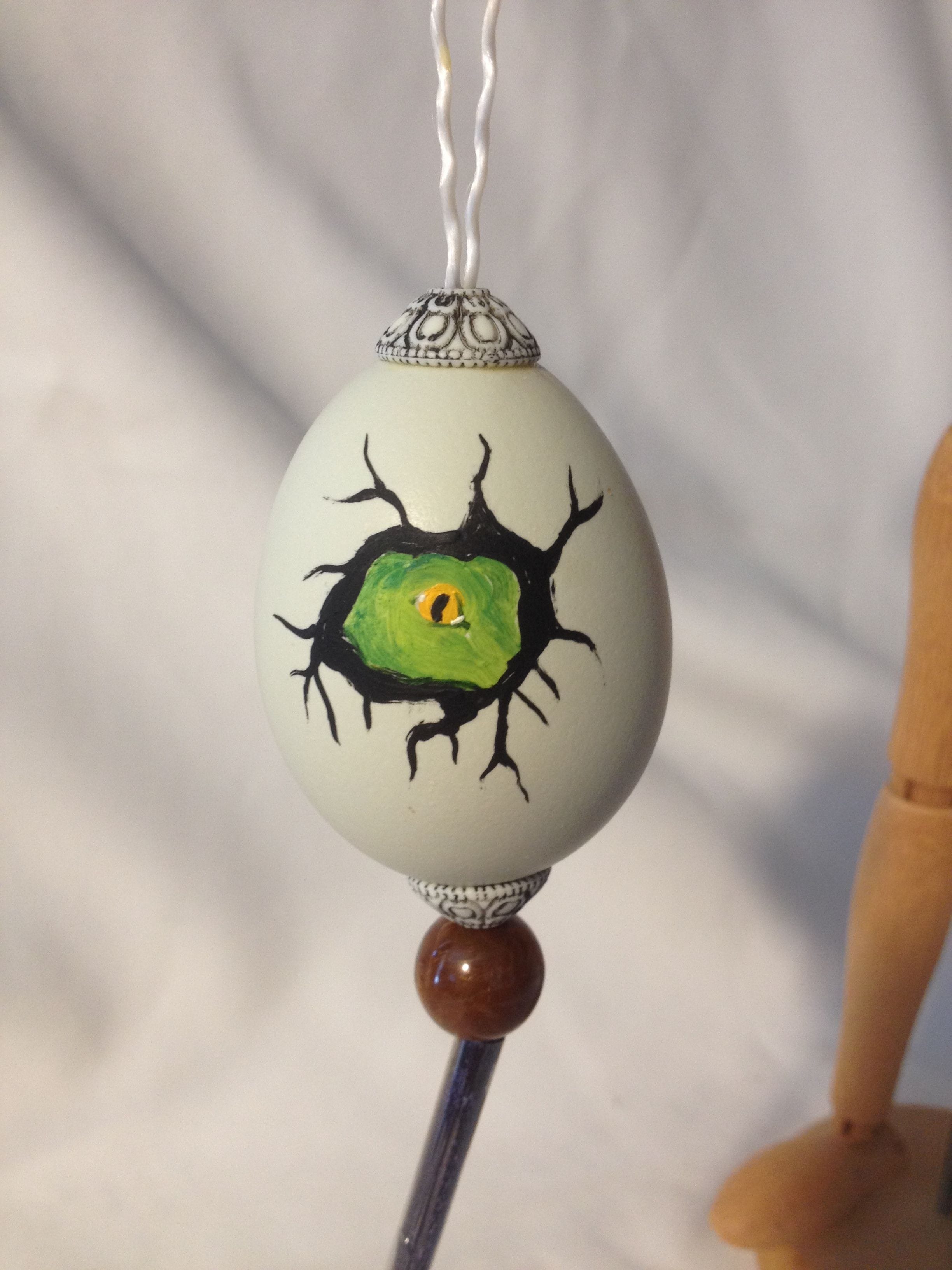 Painted chicken egg with hatching green dragonett$20.
